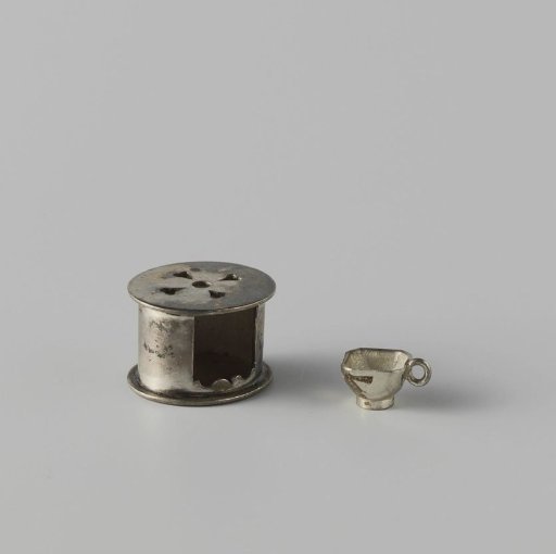 Stove with sawn-out hearts