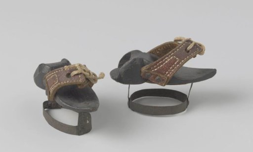Overshoe on iron stand