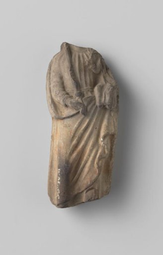 Statue of a saint in wide, broadly pleated robes