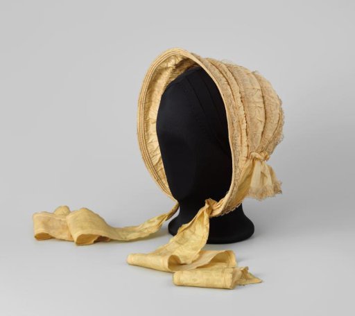Canopy hat of yellow taffeta