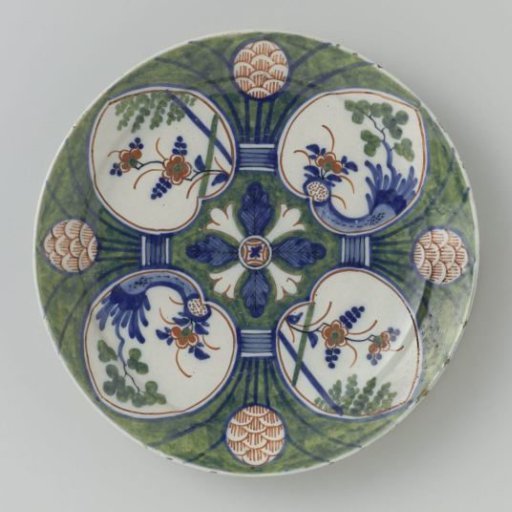 Plate of polychrome painted faience
