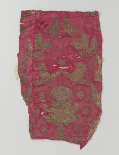 Fragment of red damask brocade with pomegranate motifs