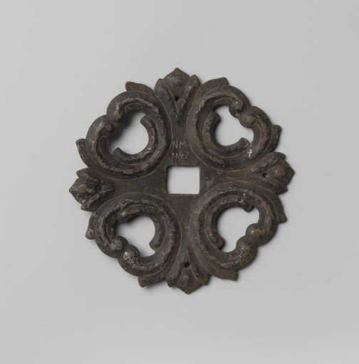 Fittings of a tinned iron door knocker, decorated with leaf motifs