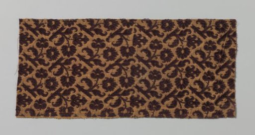 Fragment of blue/purple embossed silk velvet on a yellow taffeta ground with sparse gold inlay
