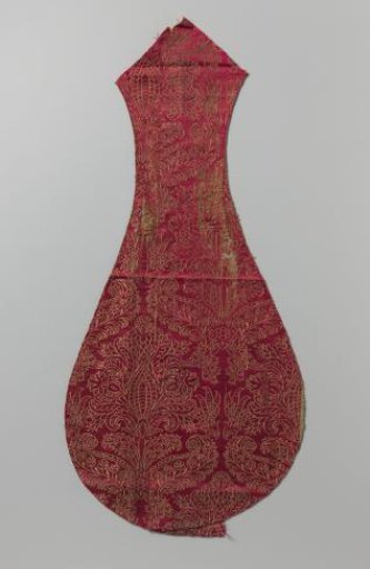Fragment of red silk satin with floral motif