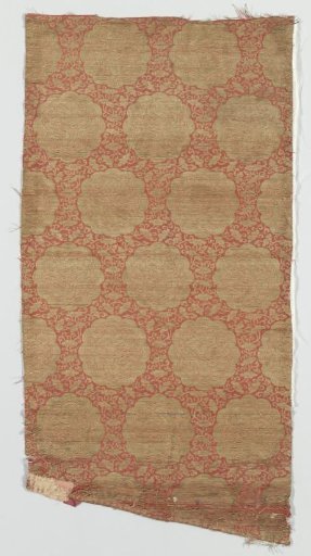 Fragment of red double weave with pattern of scalloped medallions filled with a dragon