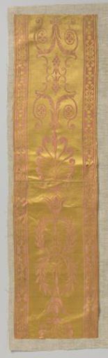 Silk border, fragment, woven on a ground of yellow satin
