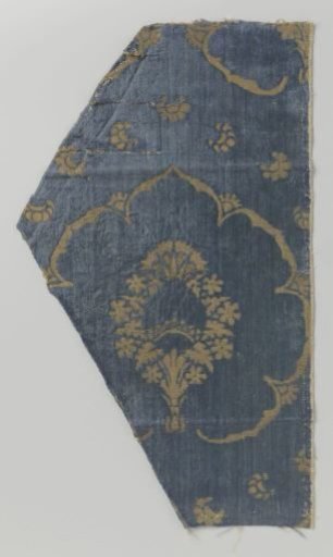 Fragment of blue velvet brocade with pomegranate motif