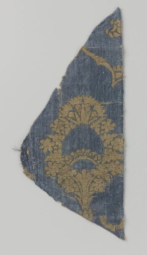 Fragment of blue velvet brocade with pomegranate motif
