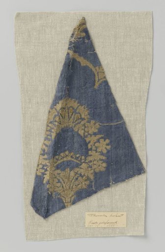Fragment of blue velvet brocade with pomegranate motif