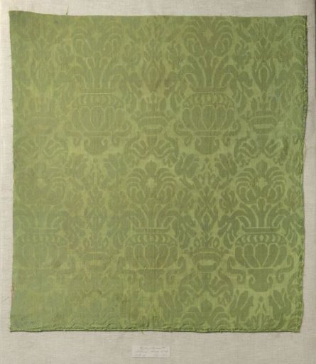 Fragment of green silk damask