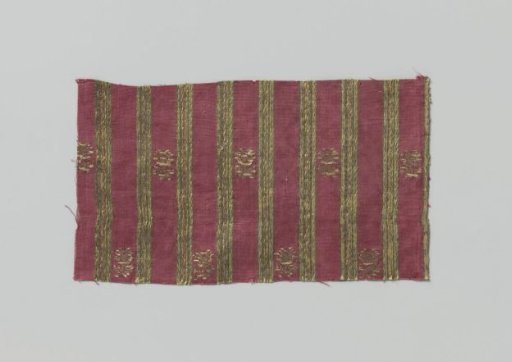 Fragment of striped silk fabric with flower branches