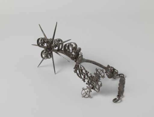 Rowel spur with seven-pointed star