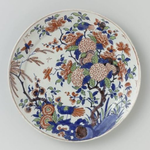 Plate of polychrome painted faience