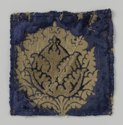 Fragment of blue velvet brocade with pomegranate motifs