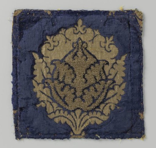 Fragment of blue velvet brocade with pomegranate motifs