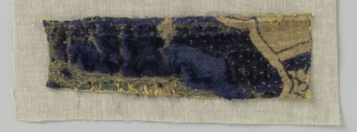Fragment of blue velvet brocade with pomegranate motifs