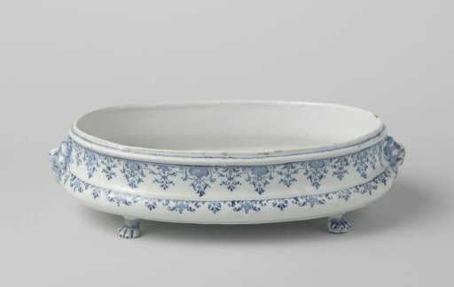 Four-legged, painted with floral and foliate scrolls