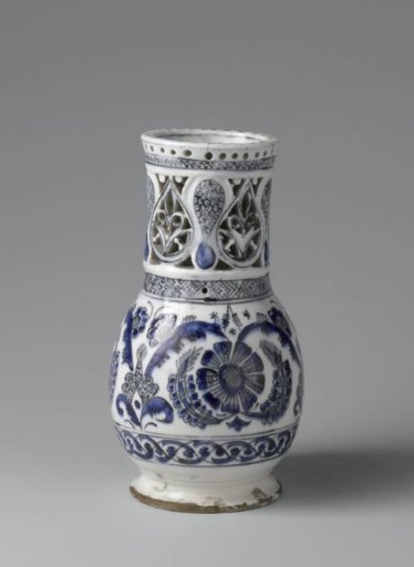 Vase with floral scrolls and pierced sides