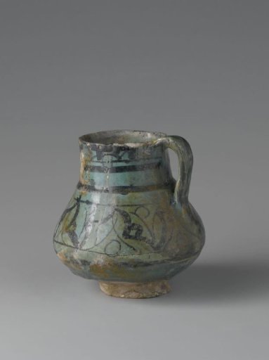 Ewer with a border with circles and spirals