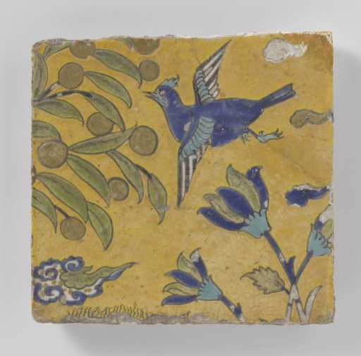 Tile with a flying bird and flowers
