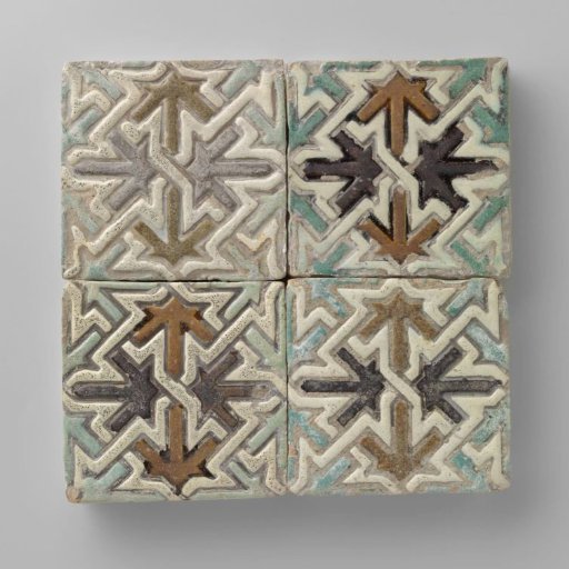 Four tiles, polychrome decorated with an ornament of interlaced stars