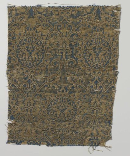 Fragment of lampas with floral pattern in yellow, gold and blue with hares in medallions