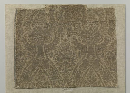 Fragment of brocatel with pomegranate motifs