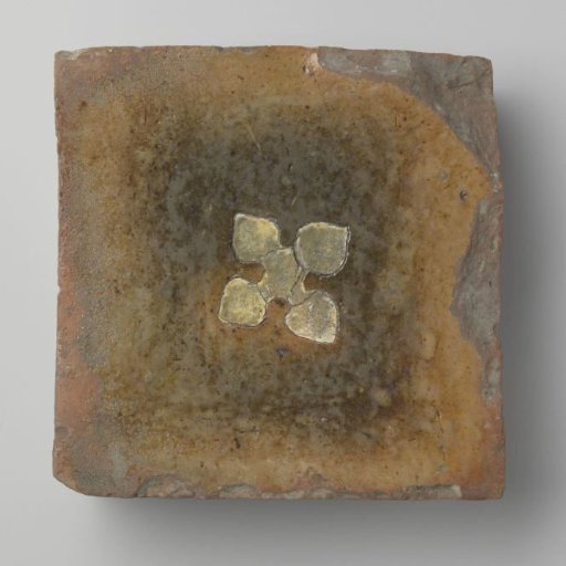 Building tile of a red clay type with beveled edges and a glazed top