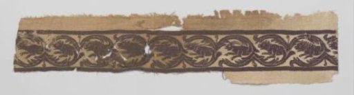 Textile fragment with decorative band