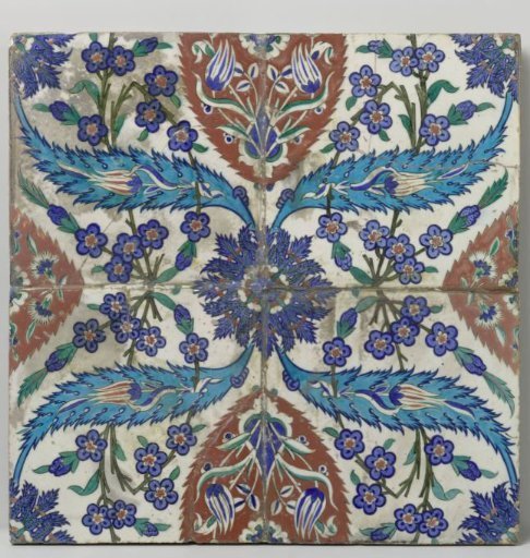 Tile panel of four tiles with a coherent pattern of palmettes, leaf forms, and flowers