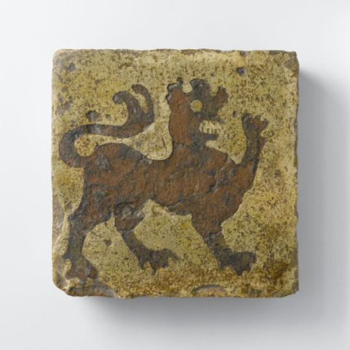 Floor tile decorated with a lion