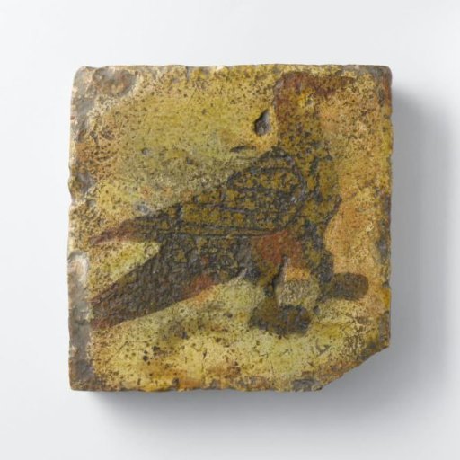 Floor tile decorated with a bird