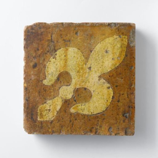 Floor tile decorated with a French lily (yellow)