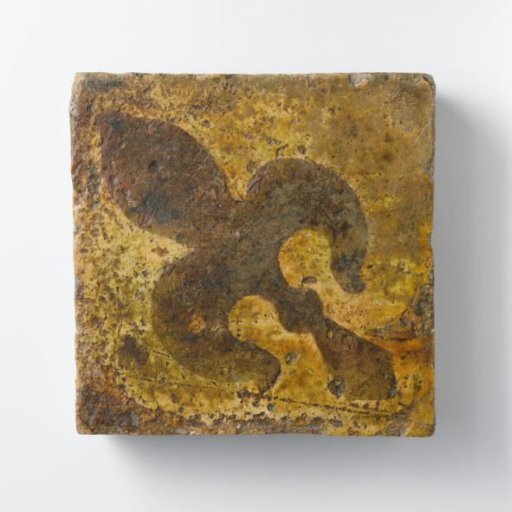 Floor tile decorated with a French lily (brown)