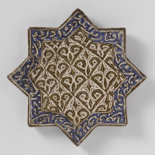 Star-shaped tile with stylized plants and pseudo-inscription