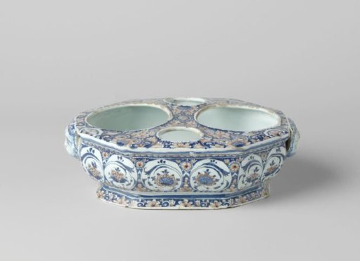 Oil and vinegar set with lion heads in relief, painted with garlands and flowers