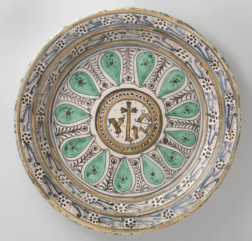Plate, polychrome painted with the letters IHS within a circle on the flat
