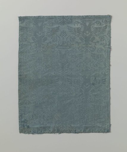 Fragment of blue silk damask with double-headed eagle