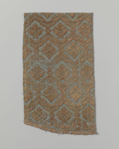 Fragment of silk velvet with a pattern in ochre on a light blue ground of interlaced bands forming lozenges containing palmettes