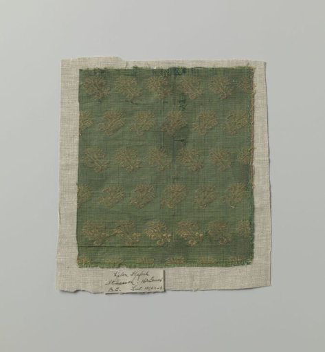 Fragment of green silk brocade
