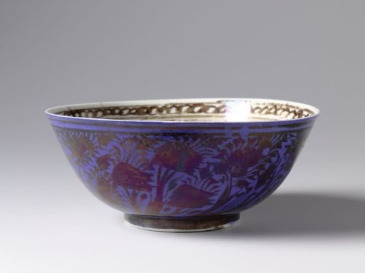 Bowl with flowering plants and floral scrolls