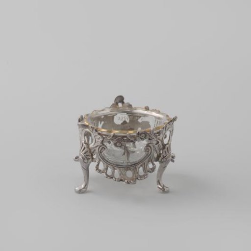 Salt cellar on three feet, composed of flower branches, C-scrolls and foam borders
