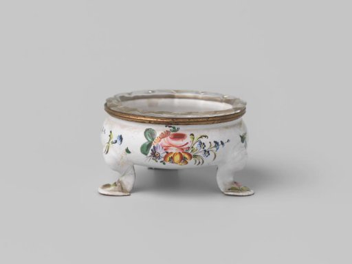 Salt cellar of enameled copper with a glass bowl featuring a drawing of naturalistic flowers on a white ground.