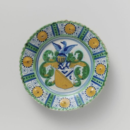 Plate, multicolored painted with a coat of arms on the flat with a bird or duck as crest. Border divided into eight compartments containing a stylized flower.