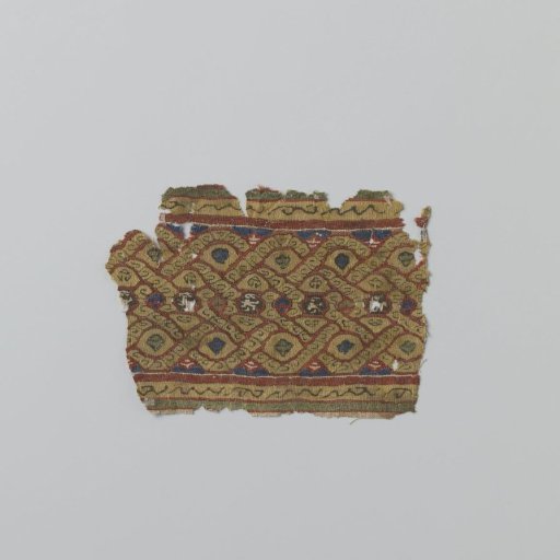 Textile fragment with decorative band