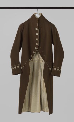 Coat of brown cloth trimmed with white silk braid, with nine buttons of mother-of-pearl with cut glass pieces, lined with white silk