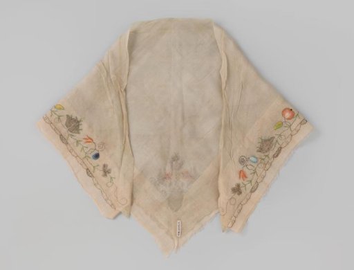 Fichu of silk, square, embroidered along two sides with a border of flowers and fruits in silver thread and multicolored silk