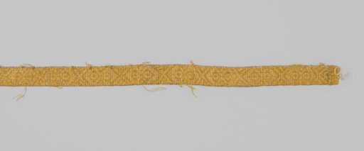Passementerie of linen and yellow silk in a diamond pattern