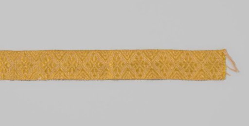 Passementerie of linen and yellow silk in a complex diamond pattern